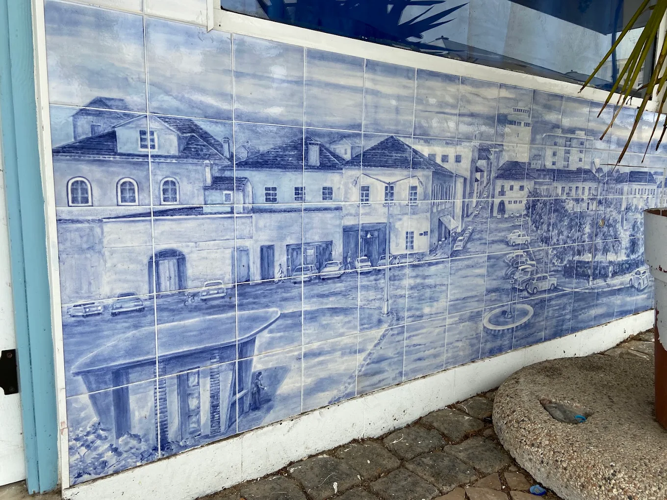 Large blue-and-white hand-painted ceramic tile mural depicting a Portimão streetscape